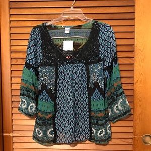 Sheer printed tunic with black trim